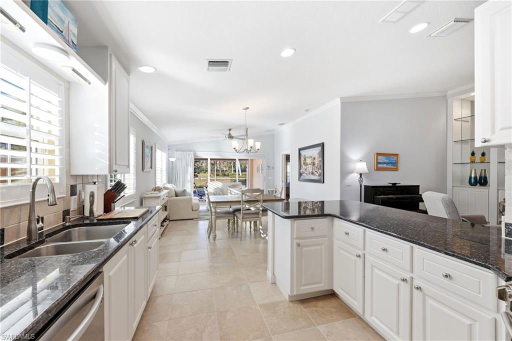 7527 Novara Court Naples, FL 34114 - Photo 10 of 50 View from Kitchen to Dining area
