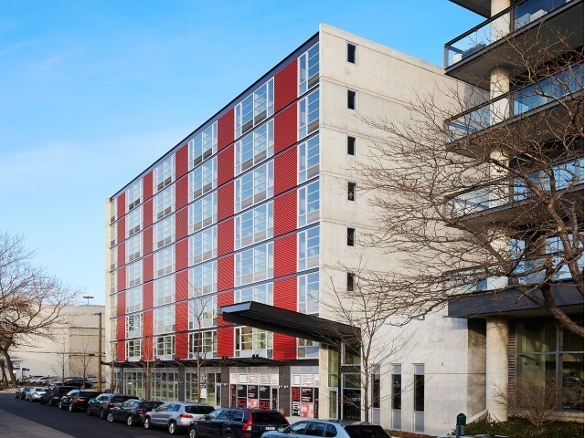 a view of a building with a street