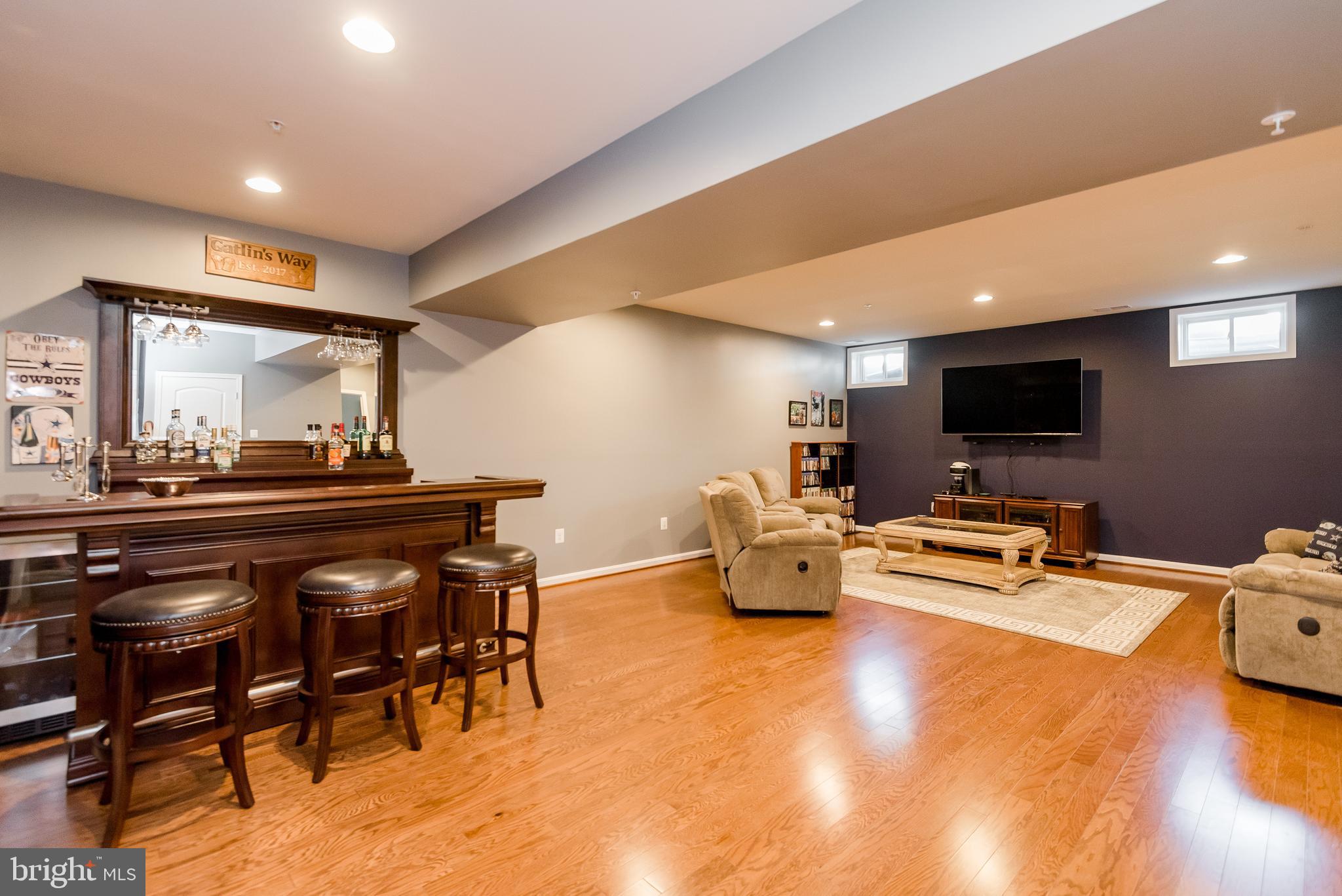 8160 Ridgely Loop Severn, MD 21144 - Photo 40 of 44 Huge basement space, with laminate hardwood floors
