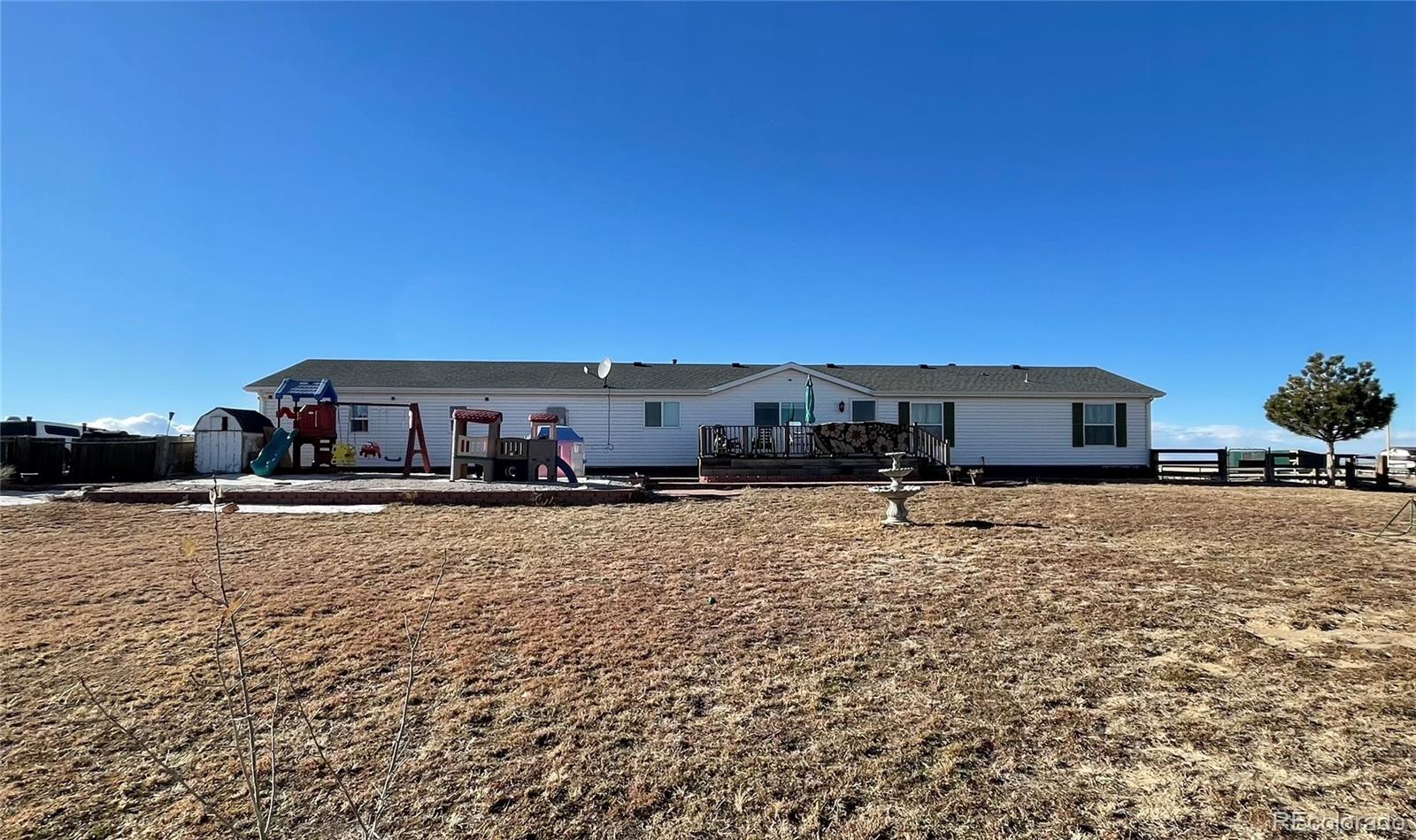 9351 Schumaker Road Bennett, CO 80102 - Photo 1 of 33 Gallery Image 1