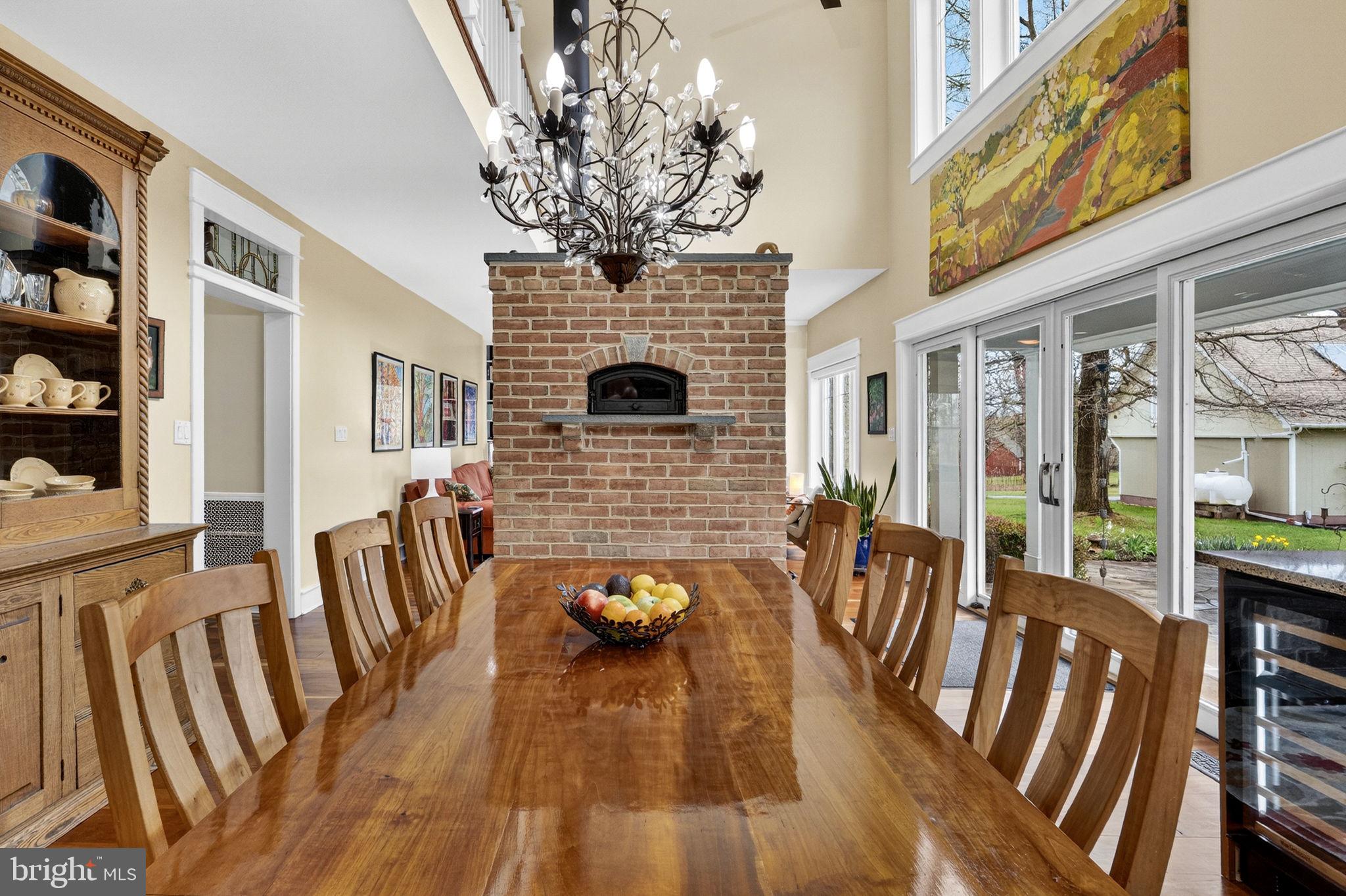 6864-6860 Engle Molers Road Shepherdstown, WV 25443 - Photo 40 of 133 Dining with masonry fireplace/wood burning stove