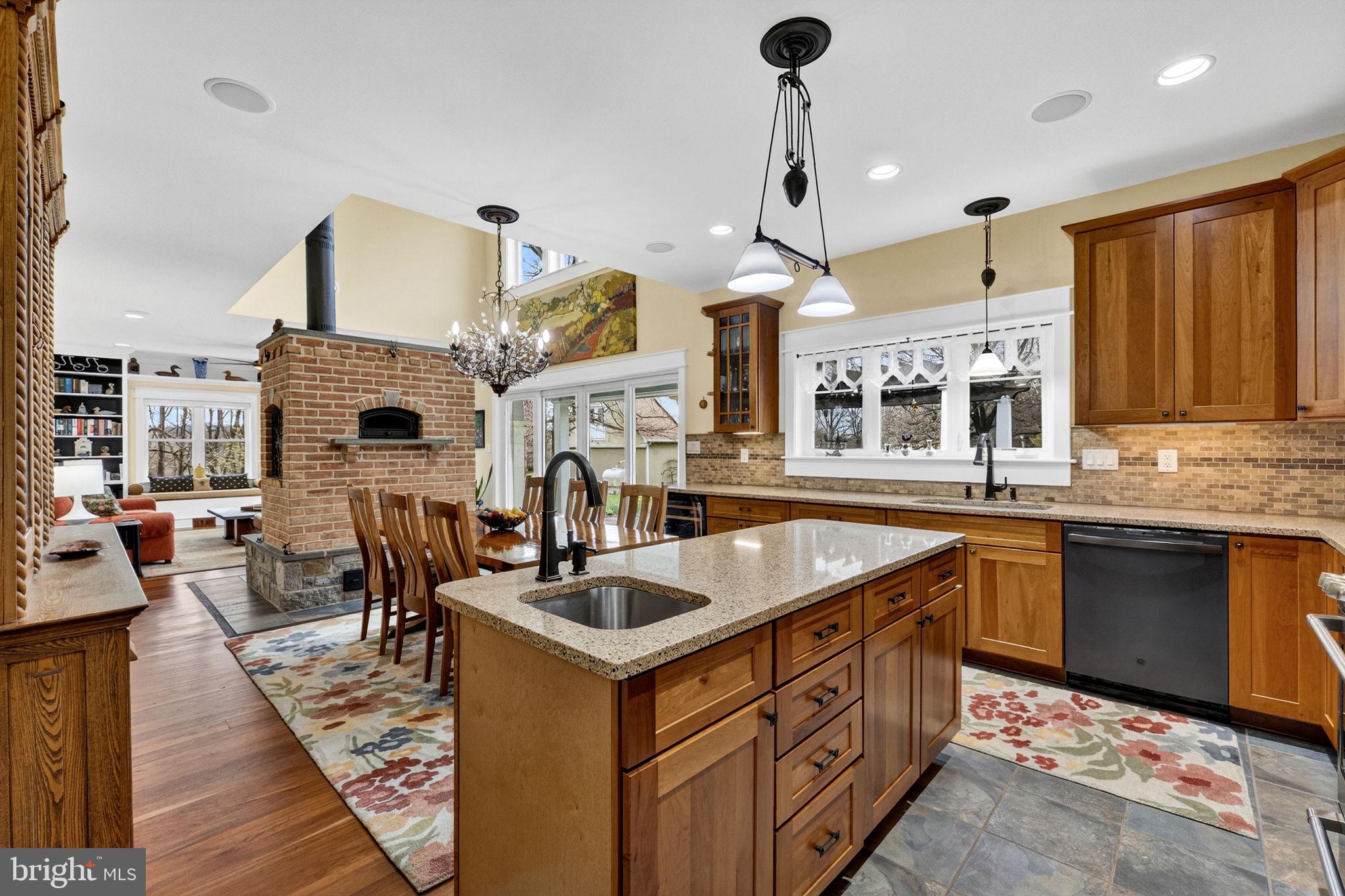 6864-6860 Engle Molers Road Shepherdstown, WV 25443 - Photo 42 of 133 Kitchen, masonry fireplace, and family room