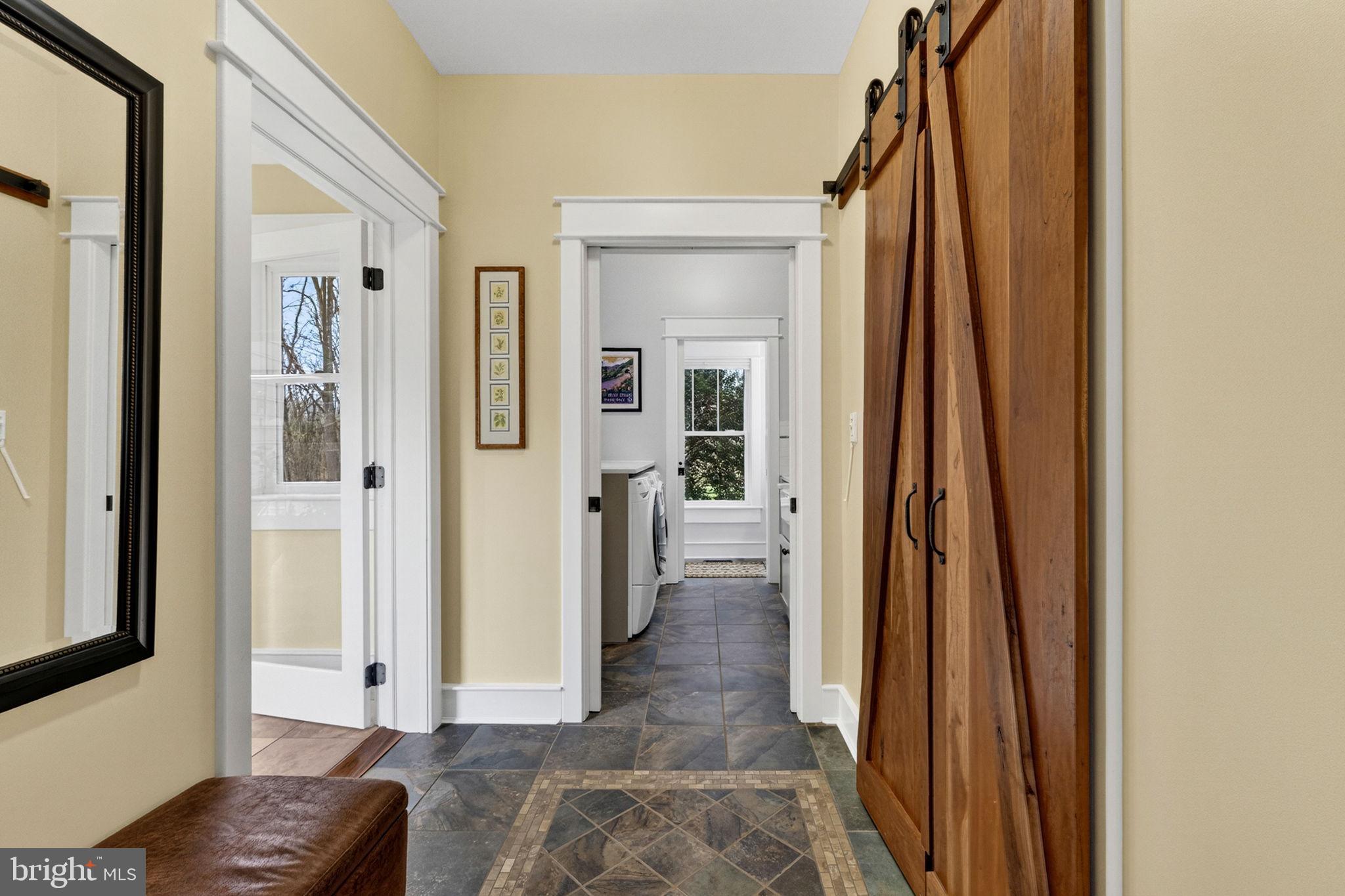 6864-6860 Engle Molers Road Shepherdstown, WV 25443 - Photo 45 of 133 Pantry access to breezeway, laundry, & powder room