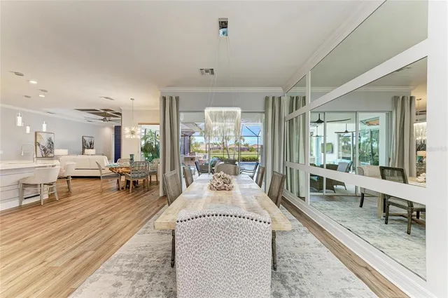 a kitchen with sink cabinets and wooden floor