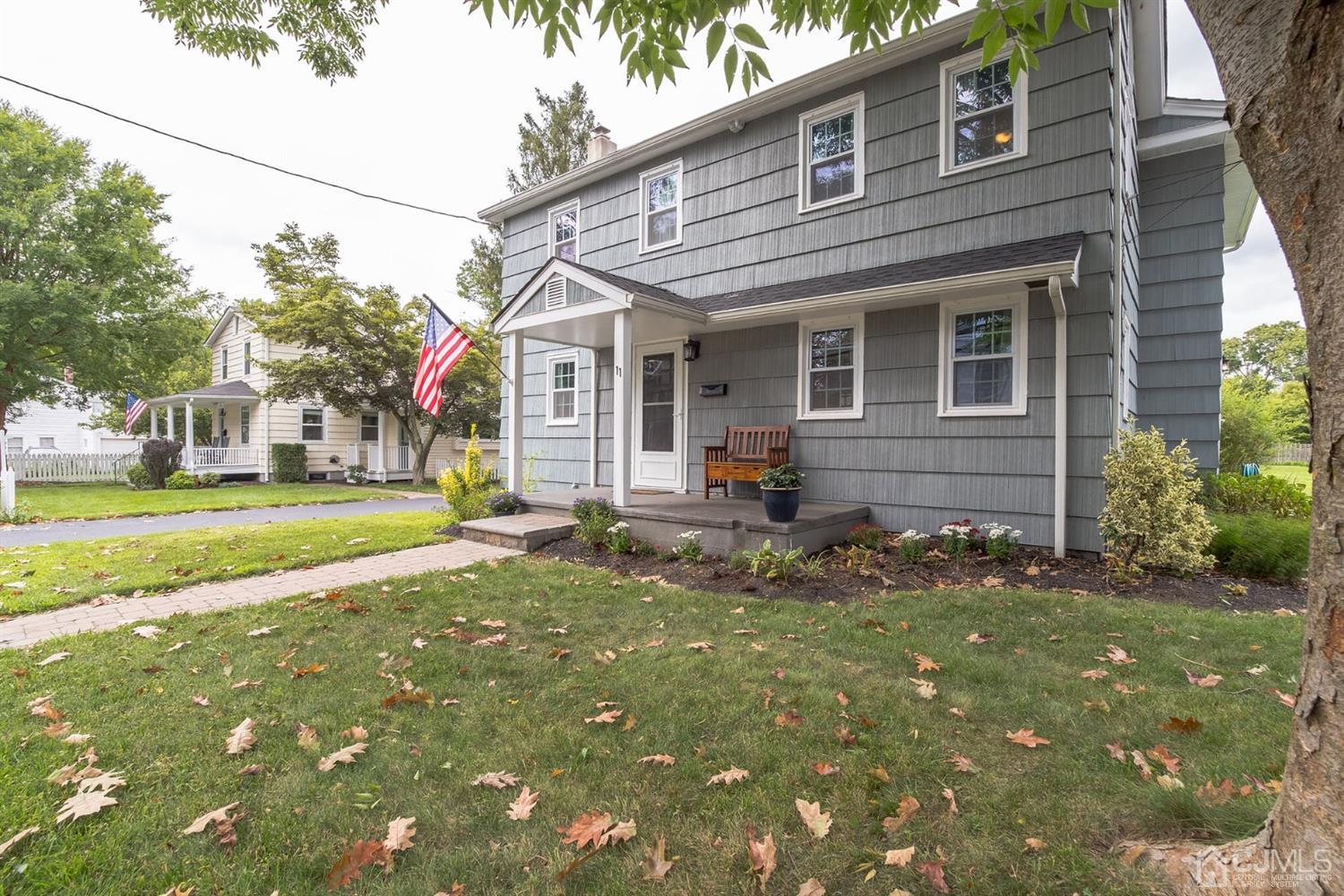 11 Station Road Cranbury, NJ 08512 - Photo 1 of 26 a view of a house with backyard and sitting area