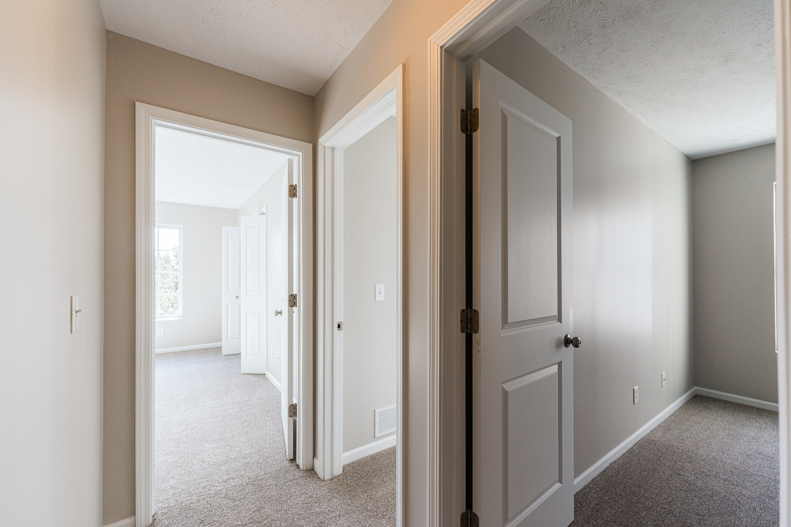 639 Stonegate Drive Sycamore, IL 60178 - Photo 18 of 32 a view of a hallway with two rooms