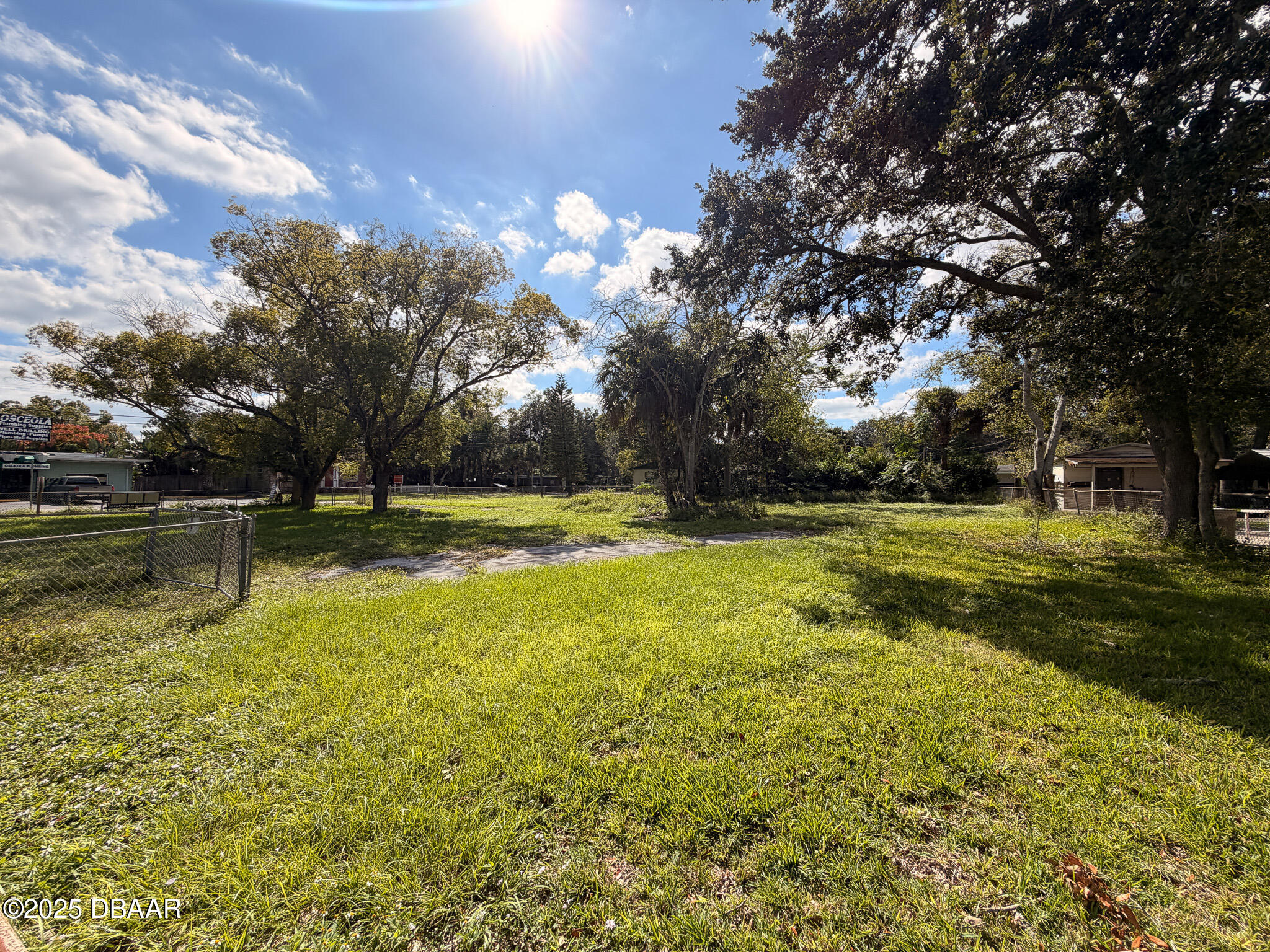 548 3rd Street Holly Hill, FL 32117 - Photo 2 of 9 a view of yard with swimming pool