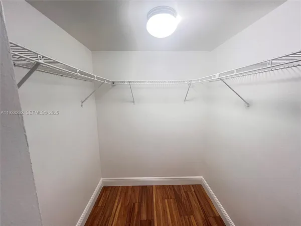 a view of a room with racks on the wall