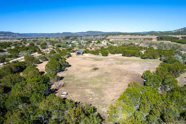 a view of a lake with mountains in the background