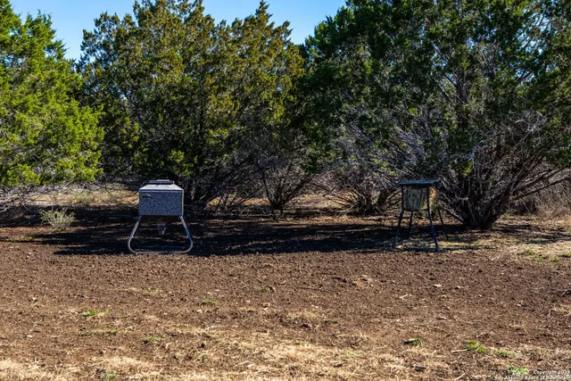 an aerial view of a house with a garden