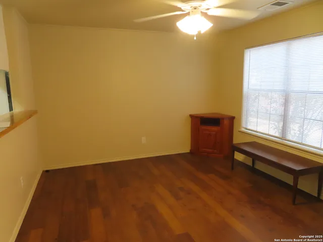 a kitchen with a sink and a stove top oven