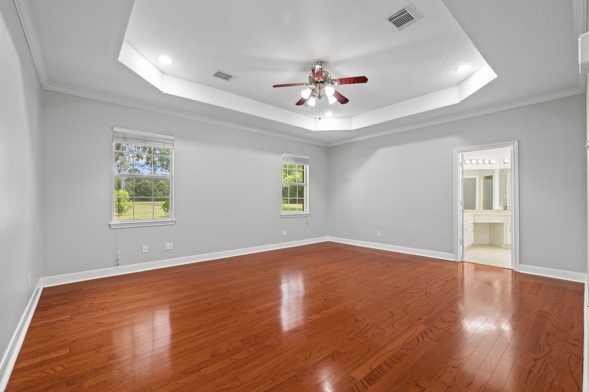 6410 Old Chocolate Bayou Road Manvel, TX 77578 - Photo 18 of 49 Bright and airy primary suite highlighted by large windows.
