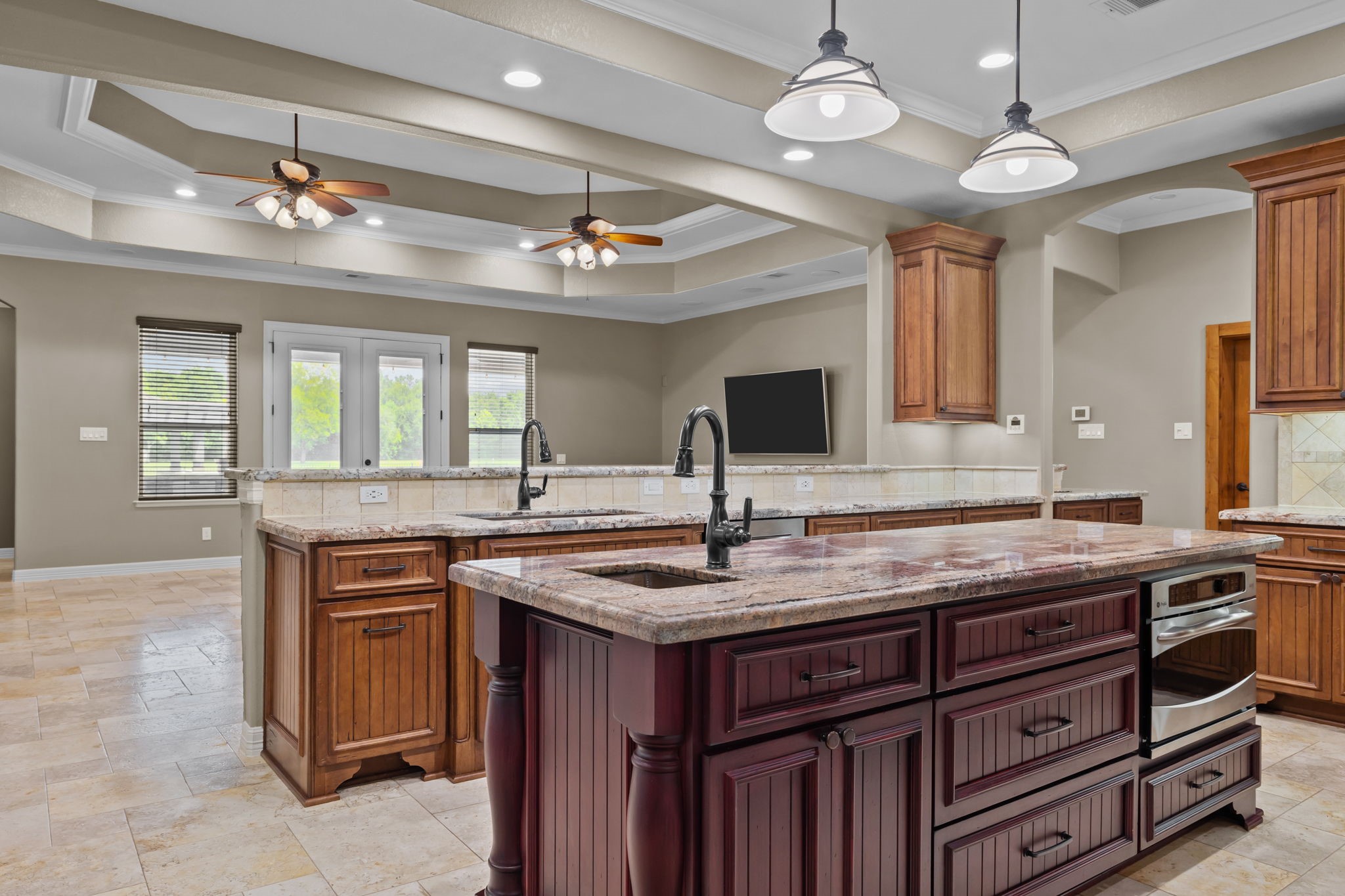 6410 Old Chocolate Bayou Road Manvel, TX 77578 - Photo 30 of 49 Spacious kitchen seamlessly
flows into the inviting great
room.