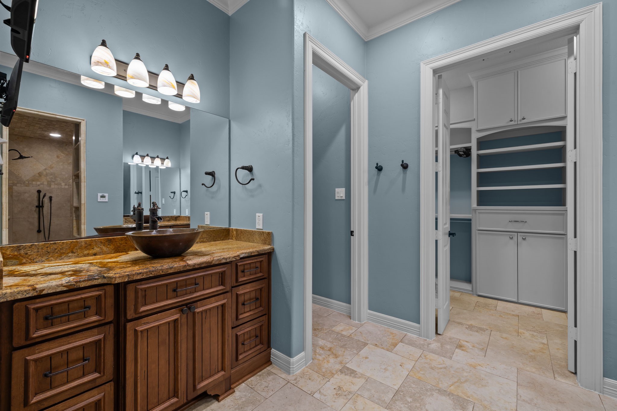 6410 Old Chocolate Bayou Road Manvel, TX 77578 - Photo 39 of 49 Luxurious bathroom featuring
elegant copper sinks and a
private water closet.