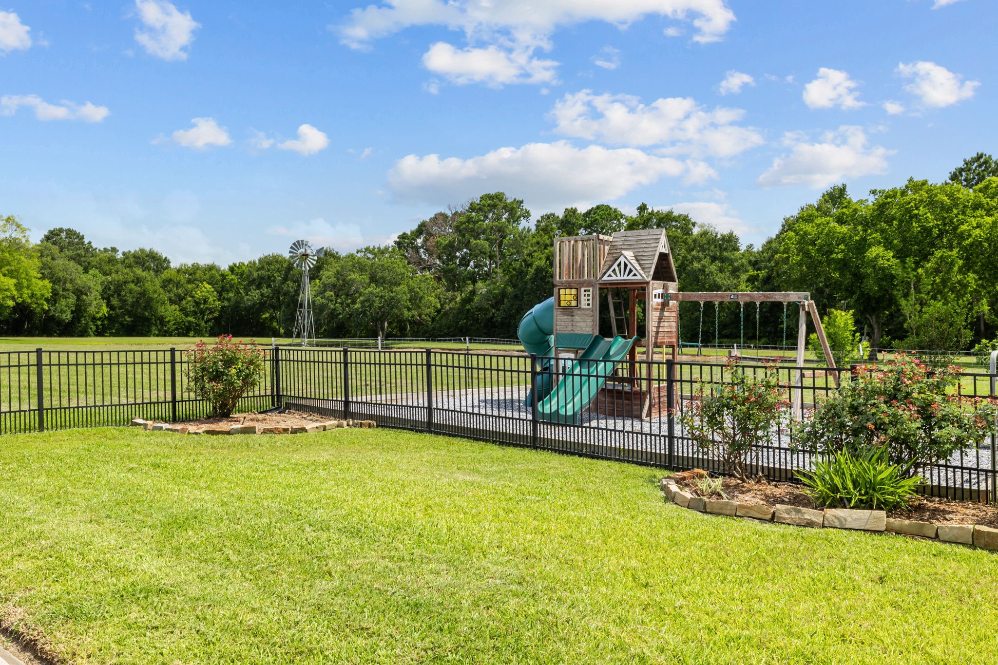 6410 Old Chocolate Bayou Road Manvel, TX 77578 - Photo 47 of 49 Charming playset, perfect for
family fun and outdoor
enjoyment.