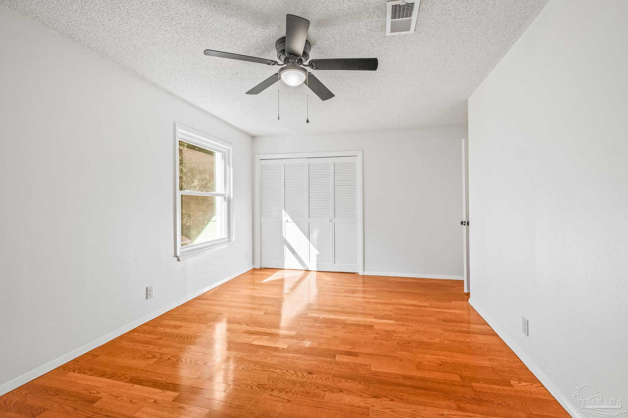 4928 Shell Road Milton, FL 32583 - Photo 40 of 60 a bedroom with a bed and window