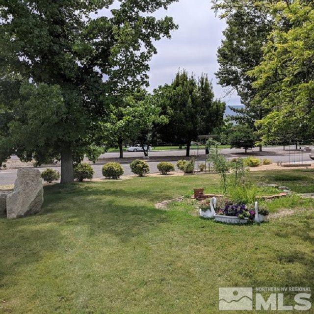 4285 Jasper Lane Reno, NV 89509 - Photo 4 of 5 a childrens park with lots of swings and slides