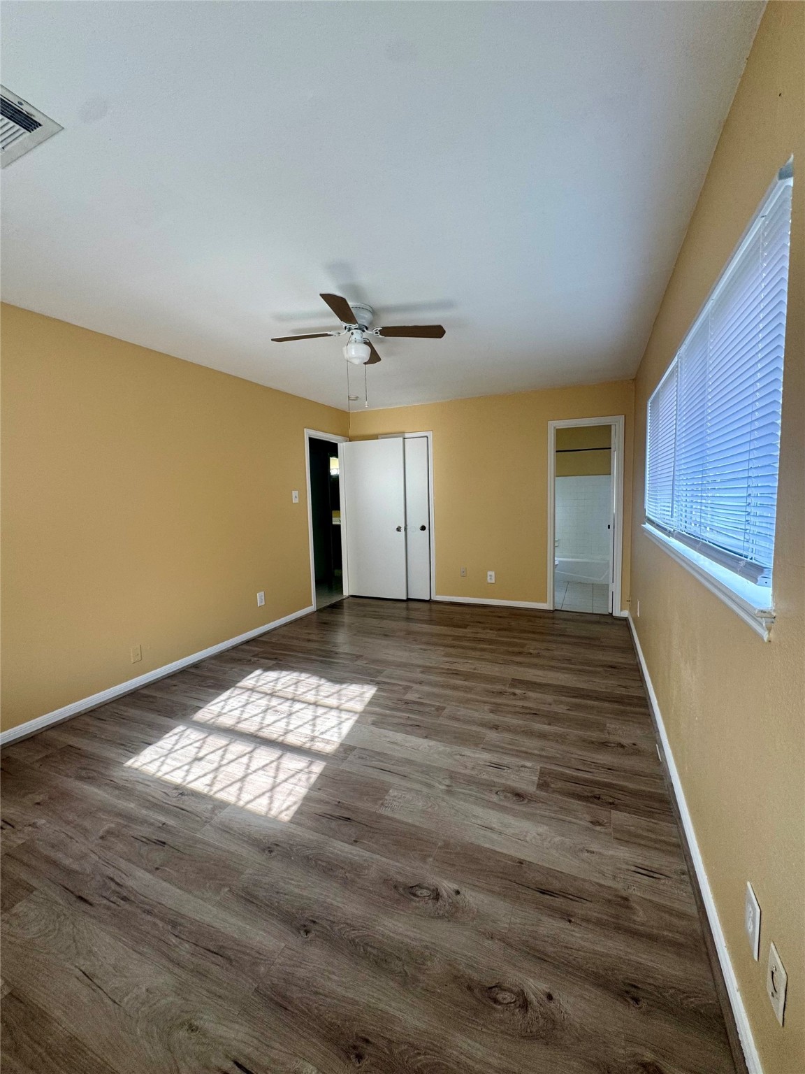 8418 Hazen Street Houston, TX 77036 - Photo 19 of 25 a view of an empty room and window