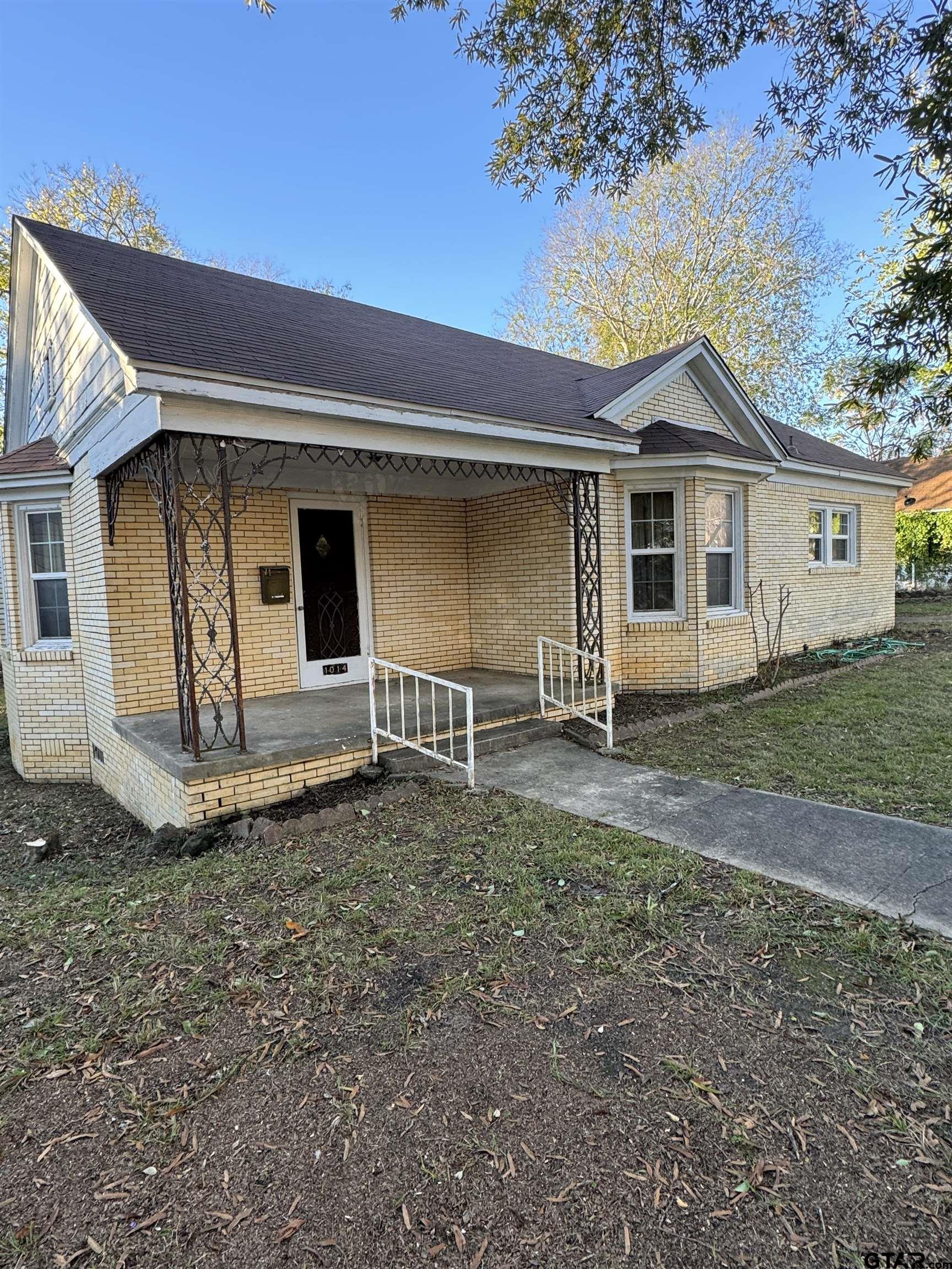 1014 Mockingbird Lane Tyler, TX 75701 - Photo 1 of 6 a front view of a house with garden