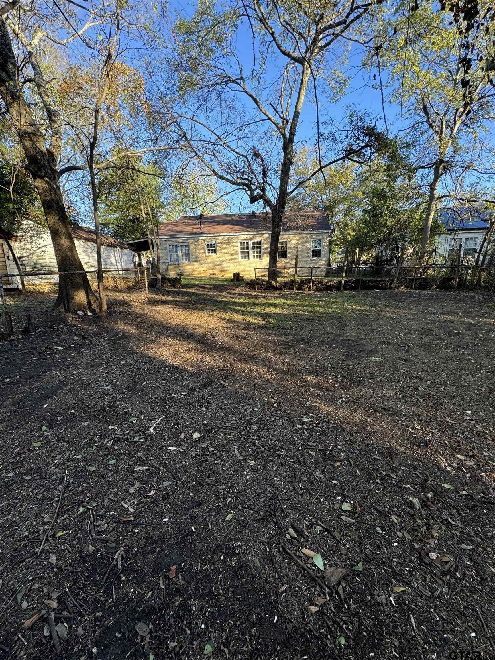 1014 Mockingbird Lane Tyler, TX 75701 - Photo 6 of 6 a view of a yard with large tree