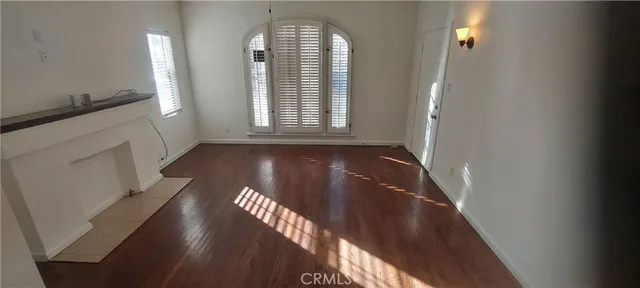 a view of balcony with wooden floor