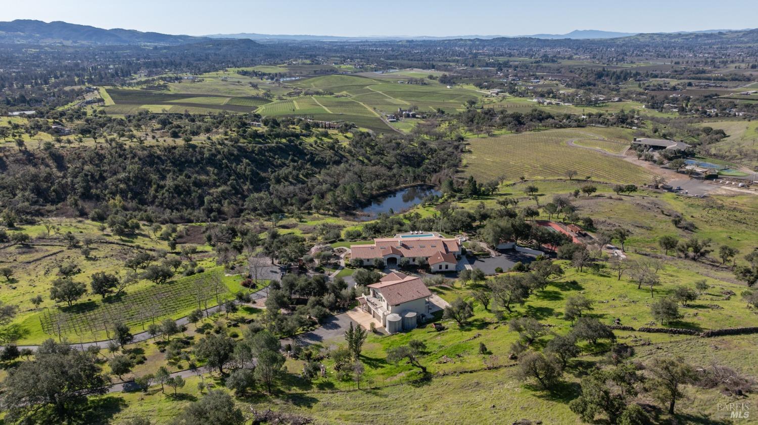 2300 Old Soda Springs Road Napa, CA 94558 - Photo 61 of 61 Stunning Napa Valley Panoramic views! Prime location on the Eastern Side of Napa, this extraordinary 39+-estate is just a few minutes away from the prestigious Silverado Country Club & dining options. TWO homes, a large pool, a recreational lake, and a lighted tennis court . Bonus: 3/4 acre cabernet vineyard offers the opportunity to continue either to trade grapes for exceptional wine cases or to craft your own vintage.