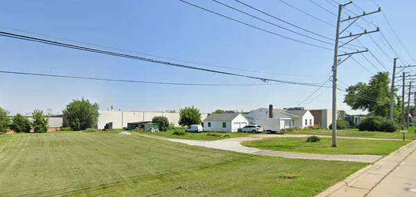 a view of a house with a big yard