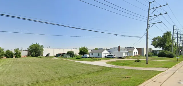 a view of a house with a big yard
