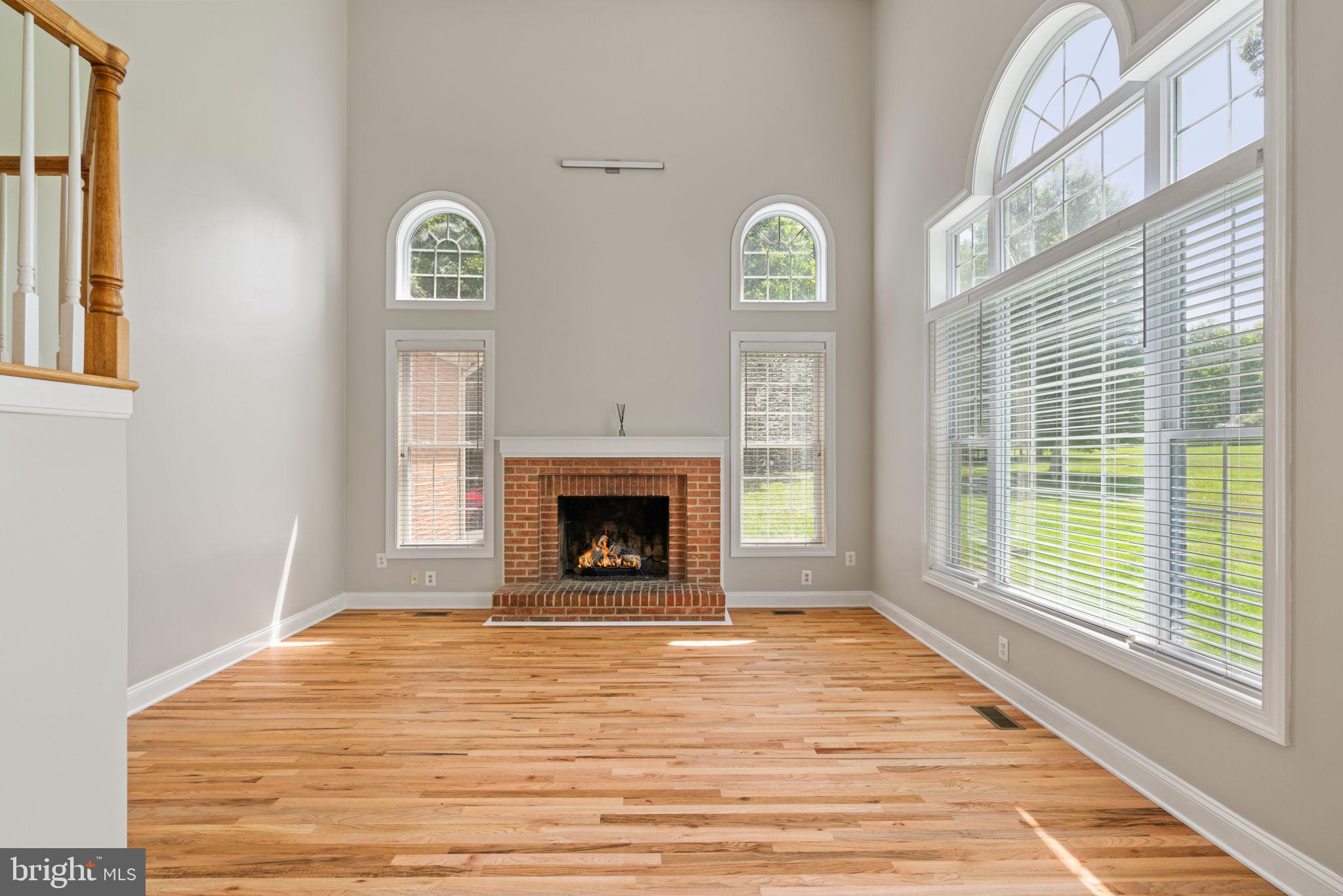 19033 Otley Road Purcellville, VA 20132 - Photo 15 of 52 Family Room with Vaulted Ceilings