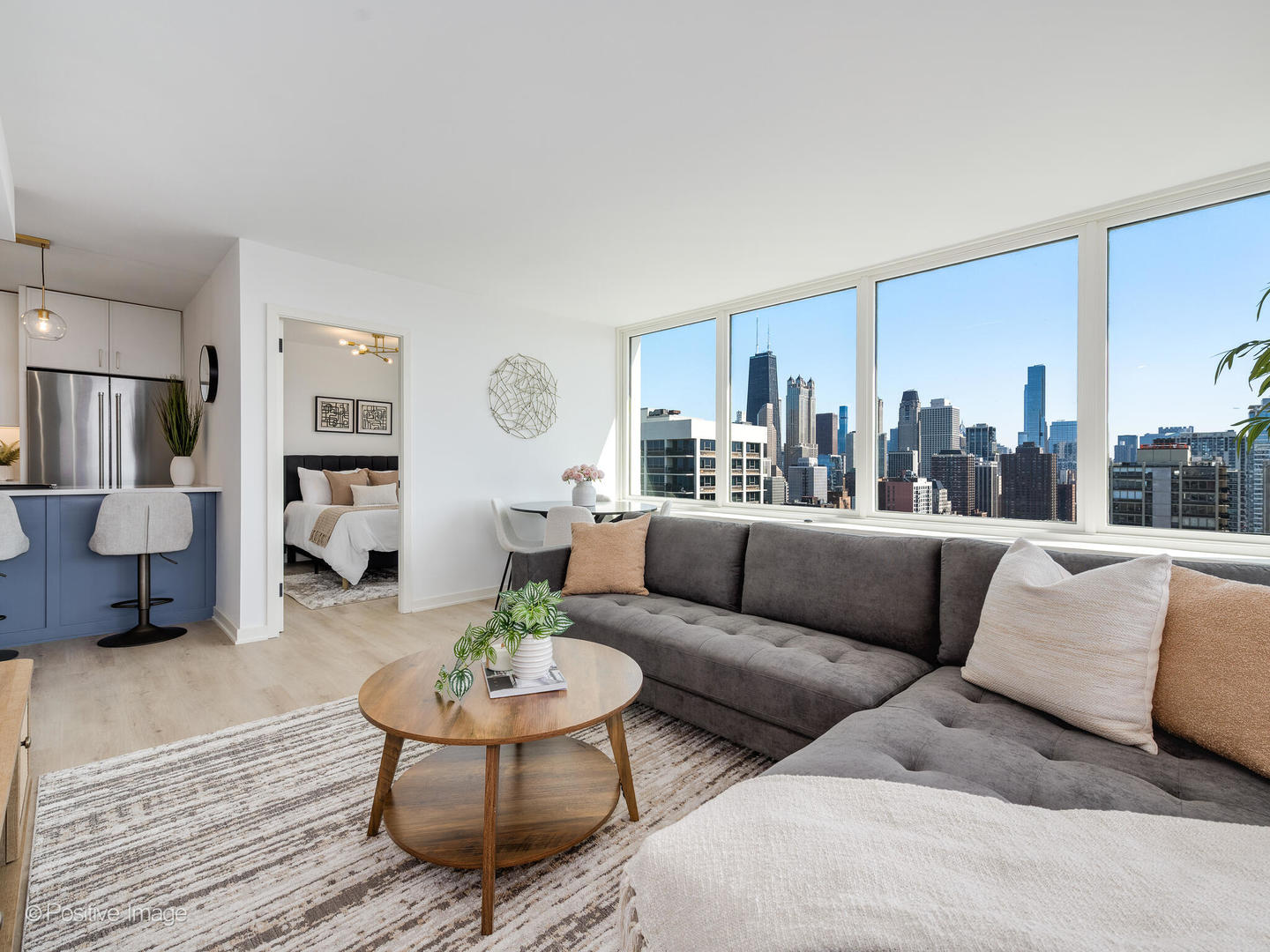 1455 North Sandburg Terrace, Unit 2901B Chicago, IL 60610 - Photo 11 of 42 a living room with furniture and a large window