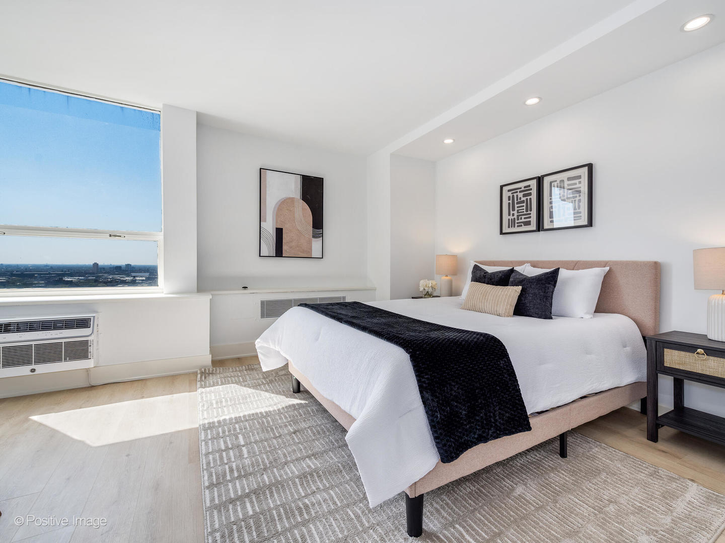 1455 North Sandburg Terrace, Unit 2901B Chicago, IL 60610 - Photo 17 of 42 a bedroom with a bed and view of kitchen