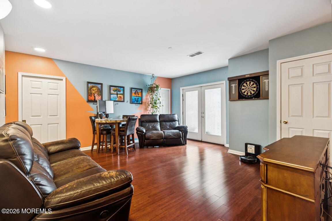 368 Rector Street, Unit 419 Perth Amboy, NJ 08861 - Photo 4 of 14 a living room with furniture and a wooden floor