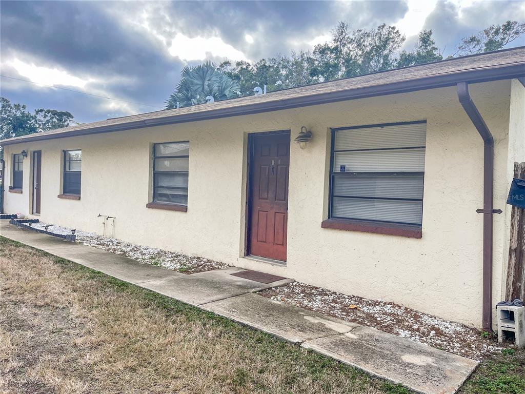 1016 9th Avenue Northwest, Unit B Largo, FL 33770 - Photo 3 of 11 a view of a house with a backyard