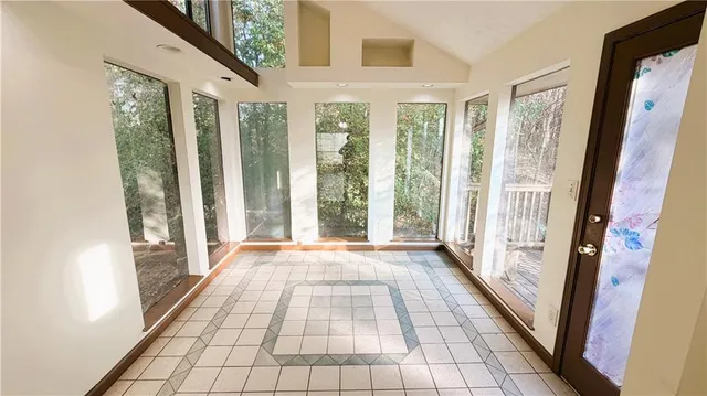 a view of a room with a large window