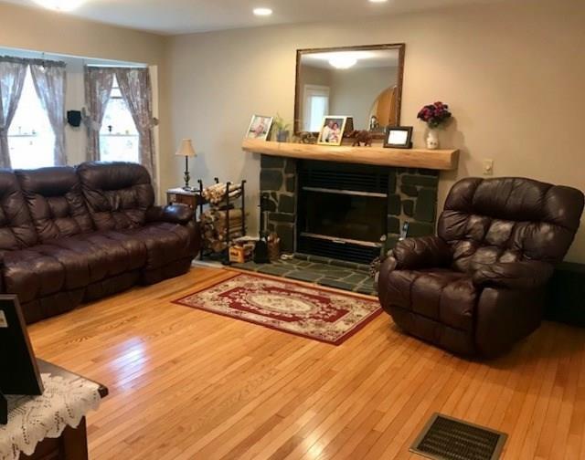 203 Waterville Road South China, ME 04358 - Photo 12 of 33 Wood floors and a wood burning...