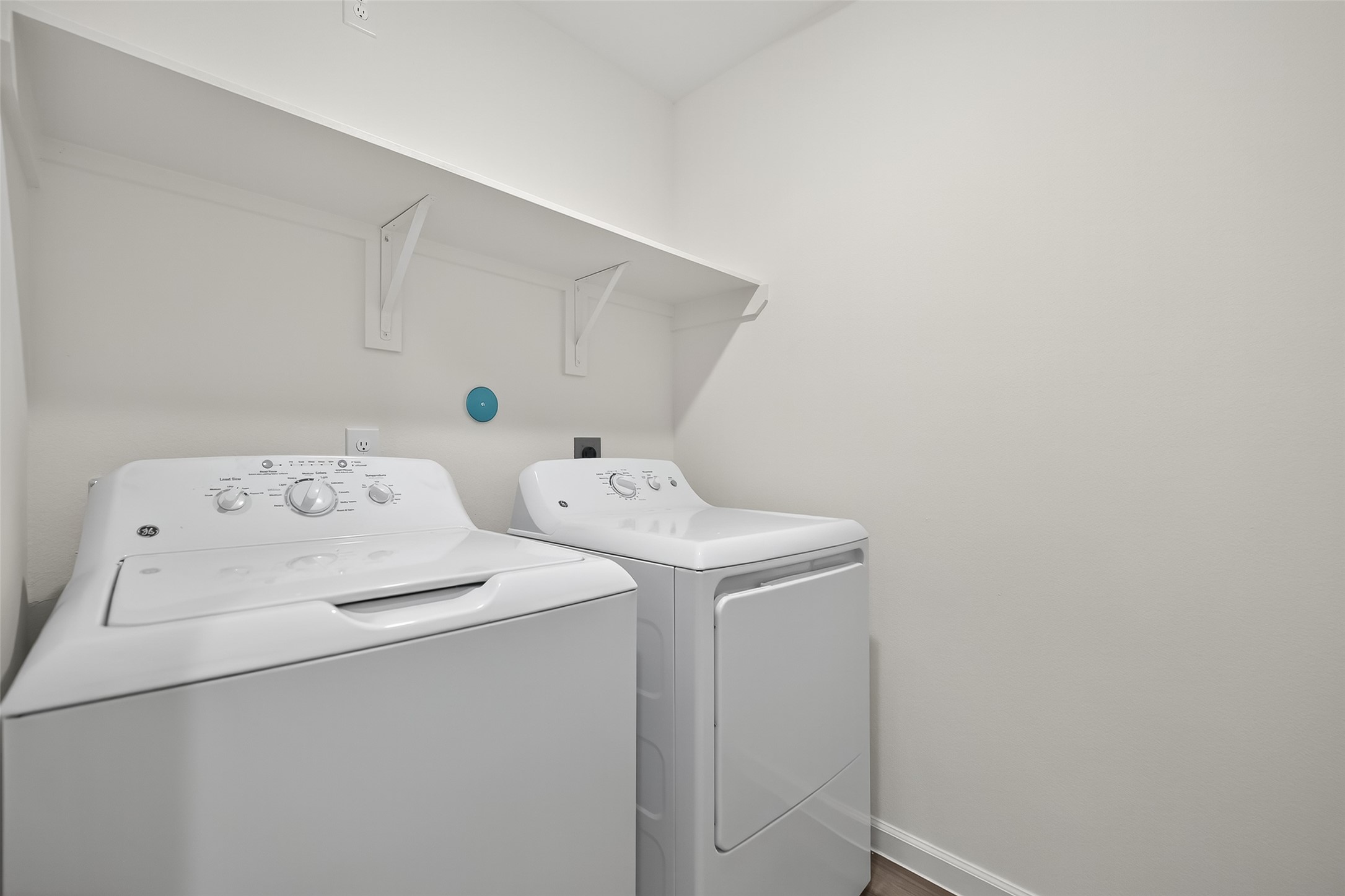 18752 Lucas Michael Way New Caney, TX 77357 - Photo 7 of 19 a utility room with dryer and washer