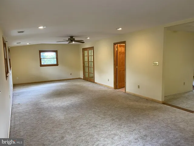 a view of a back yard of the house