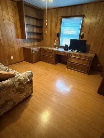 a bedroom with a bed and furniture