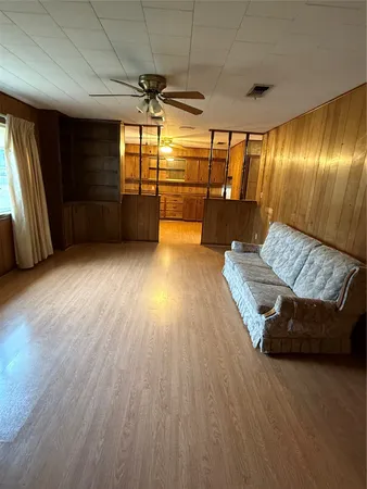 a living room with a couch and a table