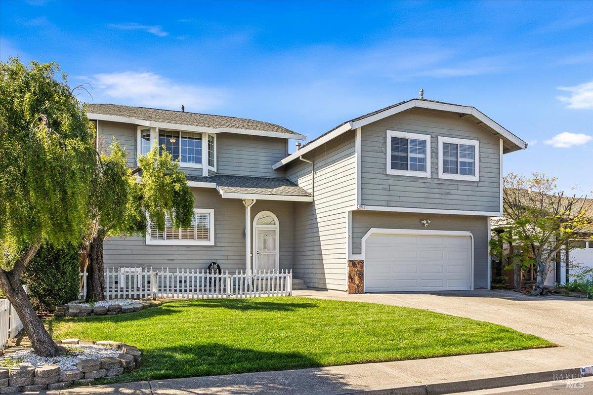 4457 Graywhaler Lane Rohnert Park, CA 94928 - Photo 2 of 51 a front view of a house with a yard and garage