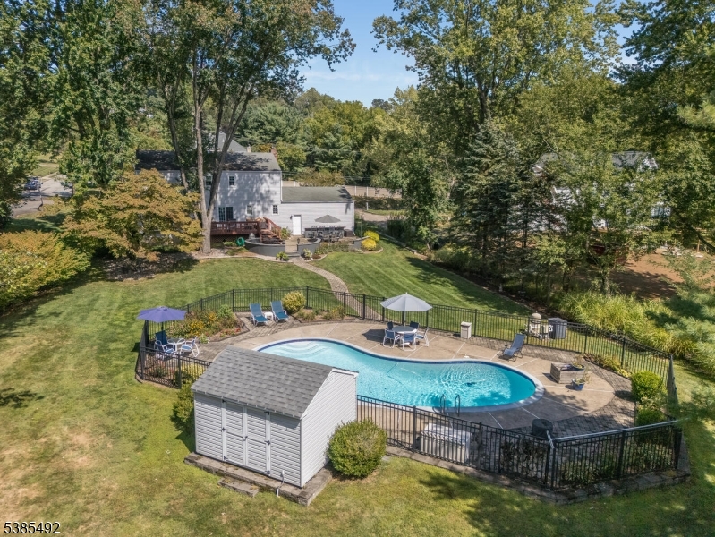 48 West Main Street Mendham, NJ 07945 - Photo 13 of 28 an aerial view of a house with outdoor space