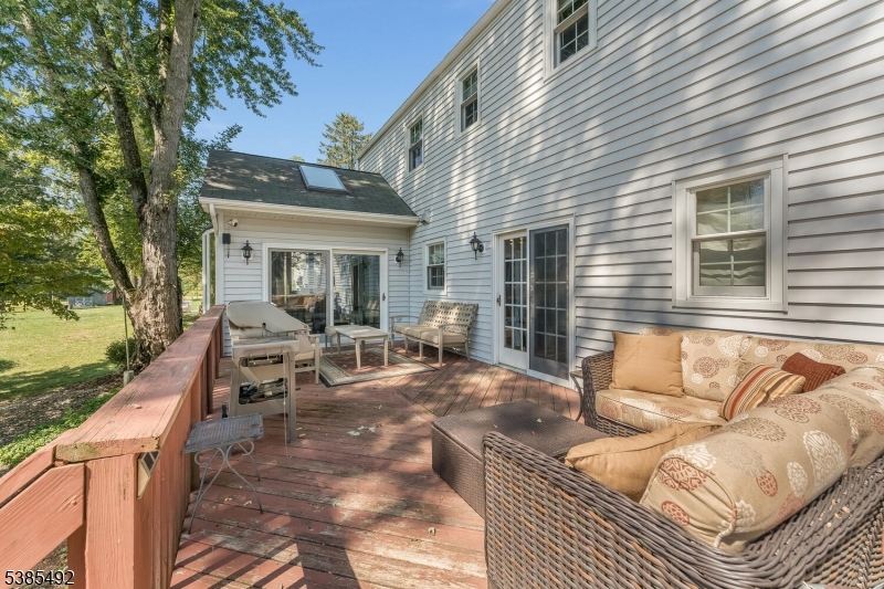 48 West Main Street Mendham, NJ 07945 - Photo 28 of 28 a view of a house with backyard and sitting area