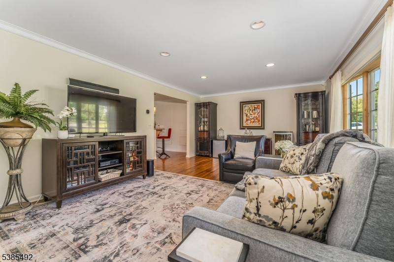 48 West Main Street Mendham, NJ 07945 - Photo 5 of 28 a living room with furniture and a flat screen tv