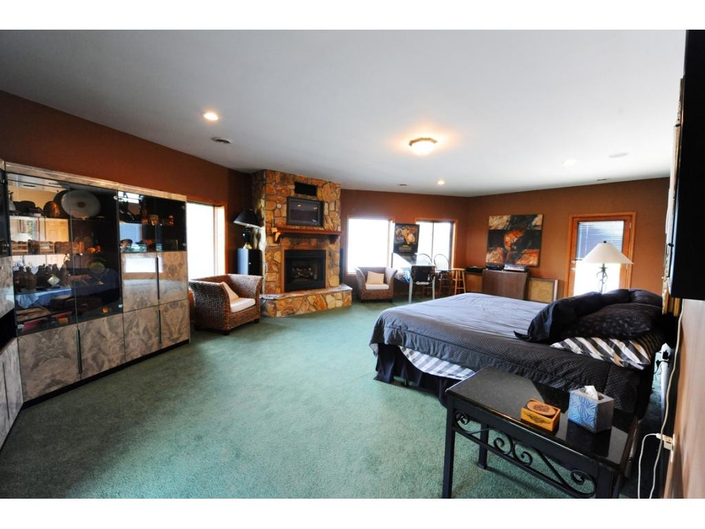 589 Harbor Point Road Butler, TN 37640 - Photo 14 of 22 BEDROOM SUITE FIREPLACE