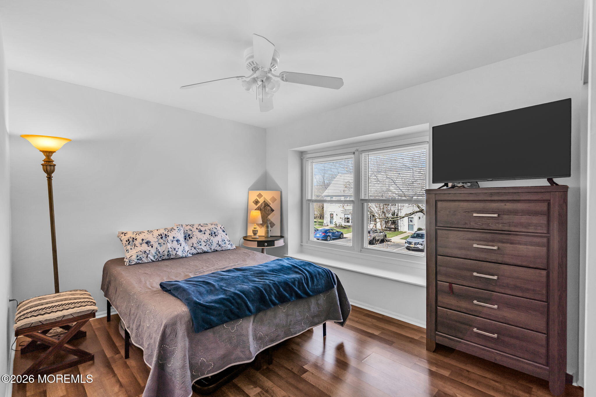 39 Independence Court Jackson, NJ 08527 - Photo 18 of 24 a bedroom with a bed and a flat screen tv
