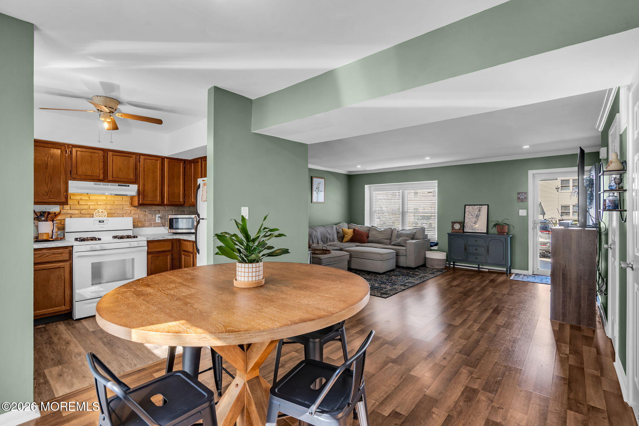 39 Independence Court Jackson, NJ 08527 - Photo 8 of 24 a view of a dining room with furniture and wooden floor