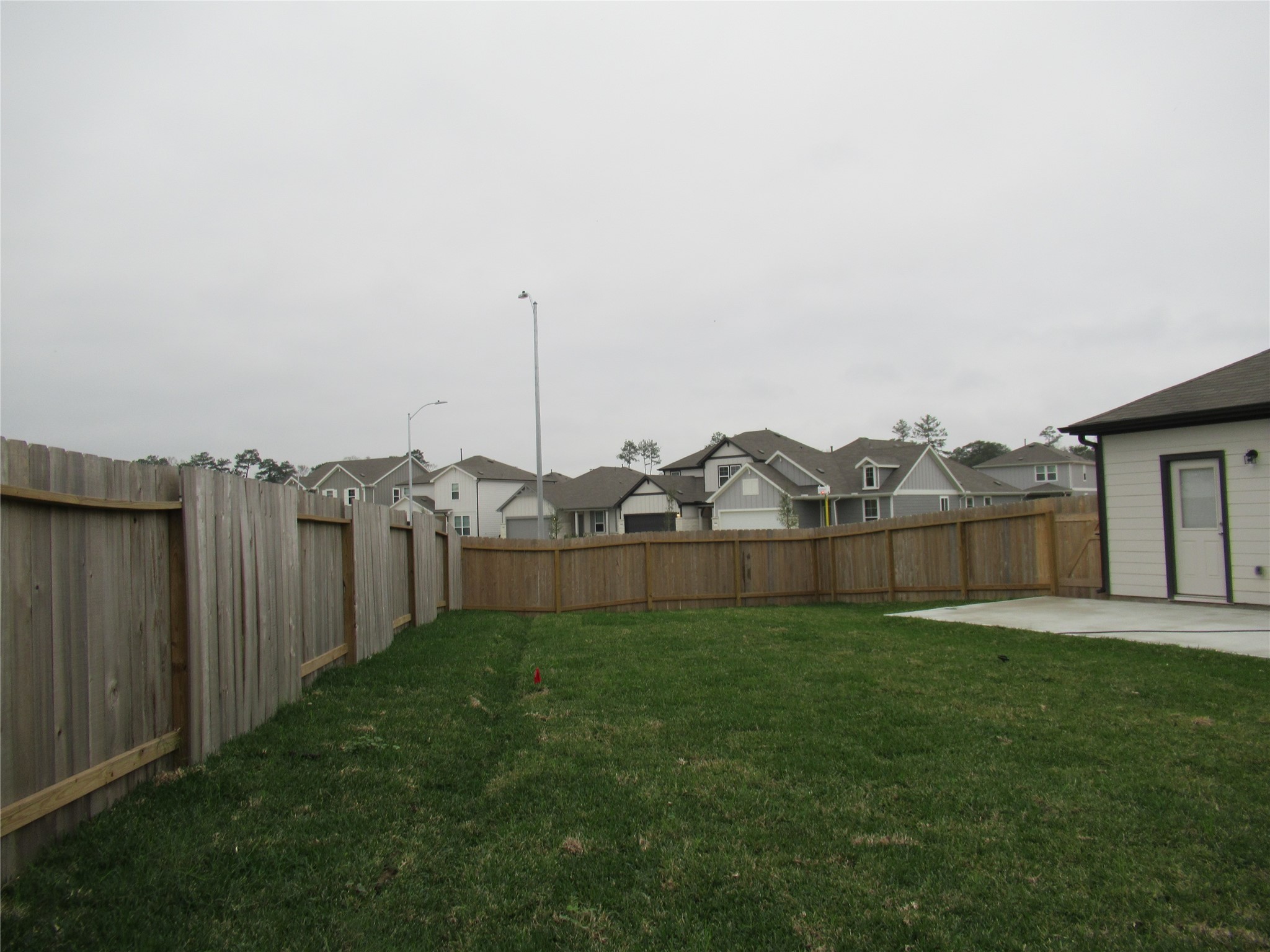 23415 Pinetum Cir Spring Spring, TX 77373 - Photo 15 of 17 a view of a garden with an buildings