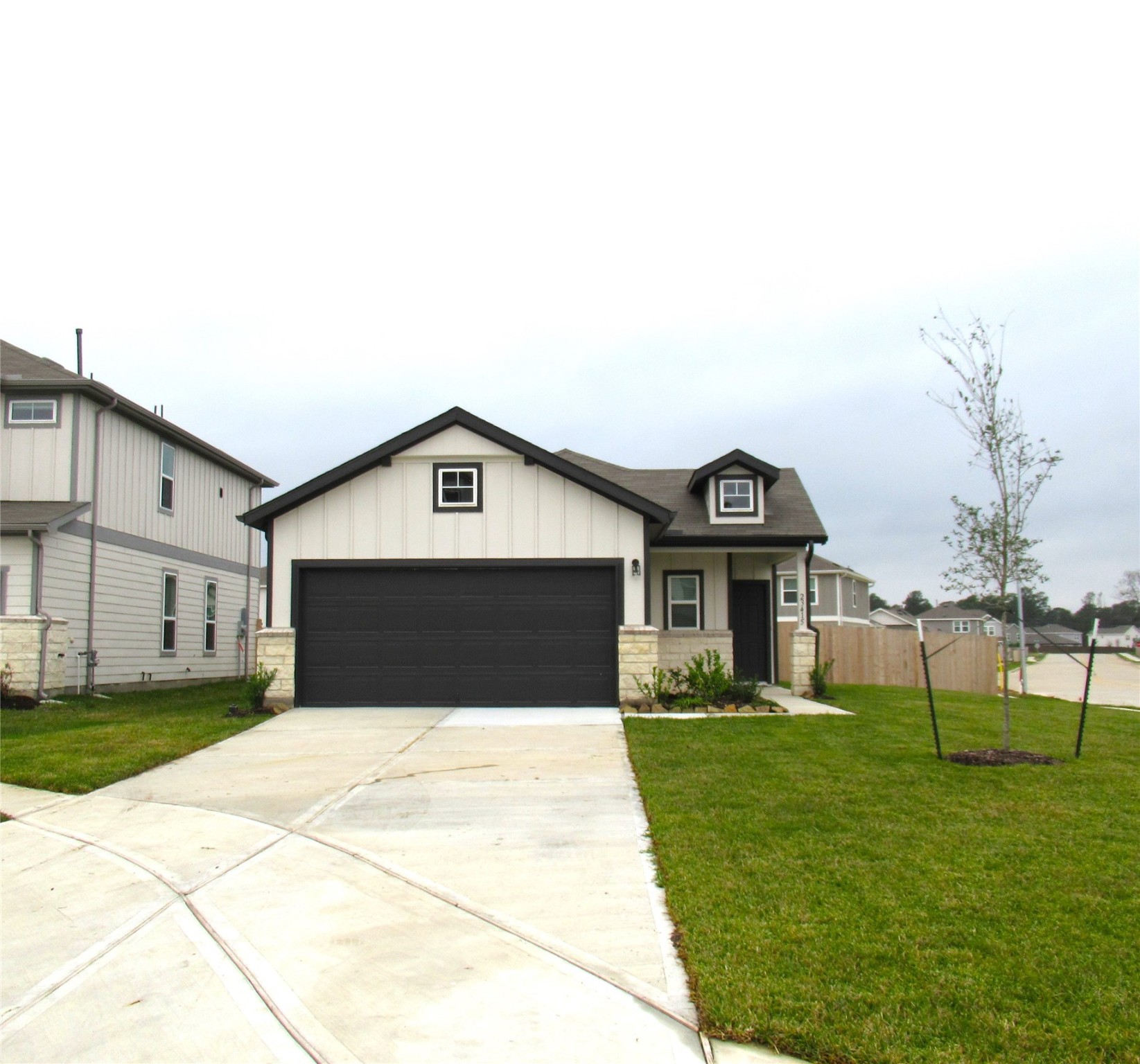 23415 Pinetum Cir Spring Spring, TX 77373 - Photo 2 of 17 a front view of house with yard