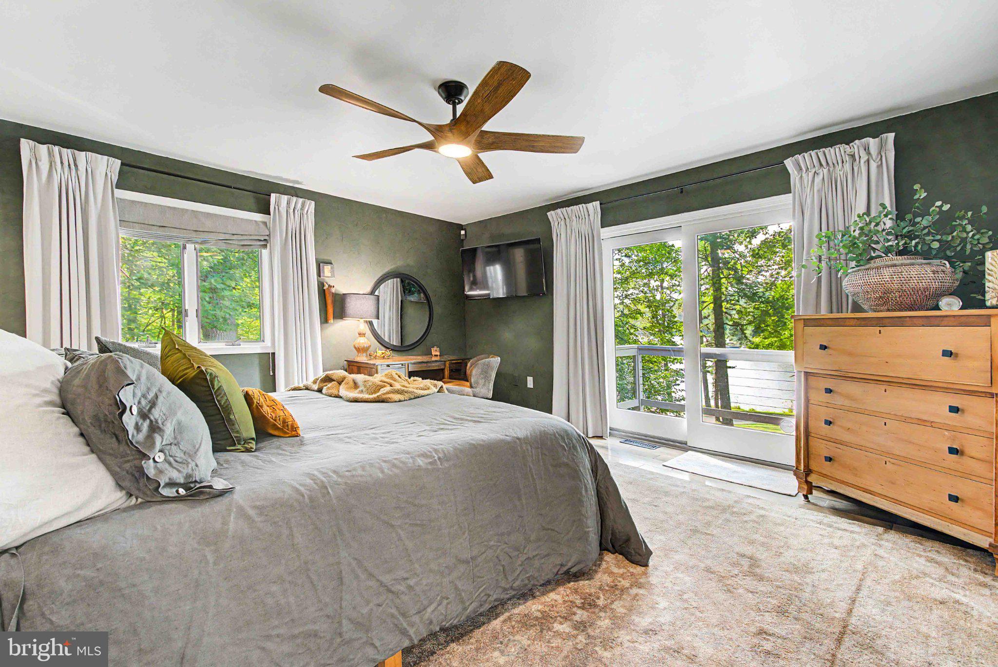 1001 Penn Point Road Oakland, MD 21550 - Photo 34 of 61 Serene bedroom with nature views.