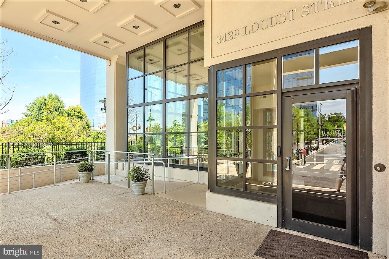 2429 Locust Street, Unit 504 Philadelphia, PA 19103 - Photo 7 of 7 a view of an entryway with a floor to ceiling window